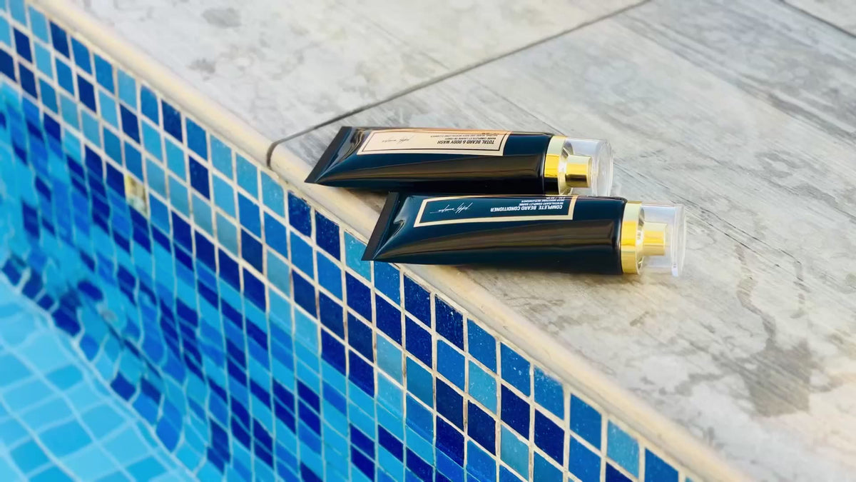Teddy Winston beard body wash and beard conditioner by a pool